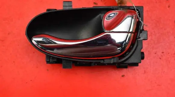 Nissan Maxima Front door interior handle