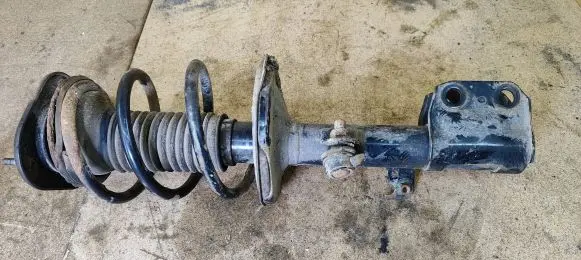 Nissan Qashqai Front shock absorber with coil spring
