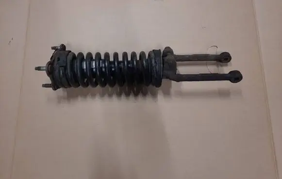 Jeep Cherokee III KJ Front shock absorber with coil spring