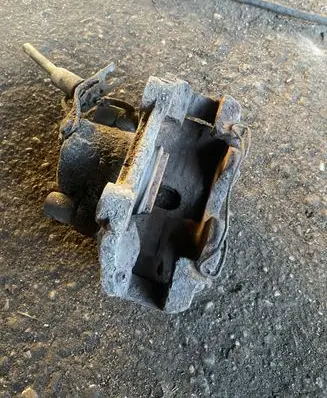 Volkswagen PASSAT B5 Front brake caliper