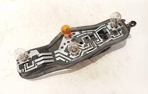 Nissan Almera N16 Tail light bulb cover holder p215w