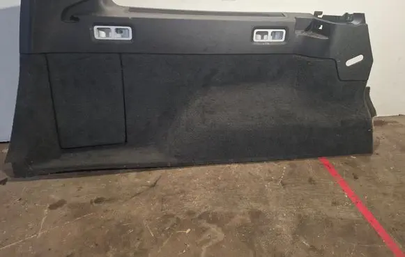 Trunk/boot lower side trim panel