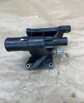 Thermostat/thermostat housing