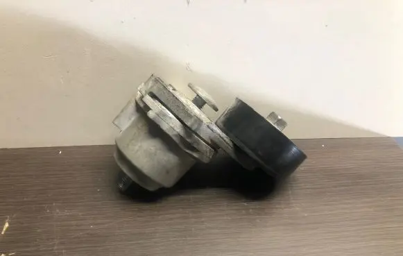Opel Astra J Generator/alternator belt tensioner 