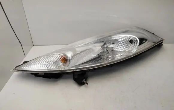 Nissan Juke I F15 Headlight/headlamp 15D34