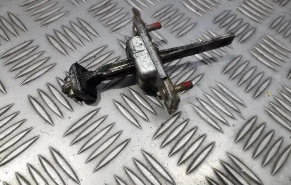 Mazda 626 Rear door check strap stopper