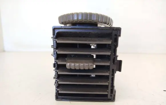 Nissan X-Trail T30 Dash center air vent grill 68750EQ000 E6475161