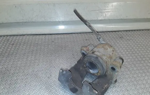 Volkswagen Golf V Front brake caliper 
