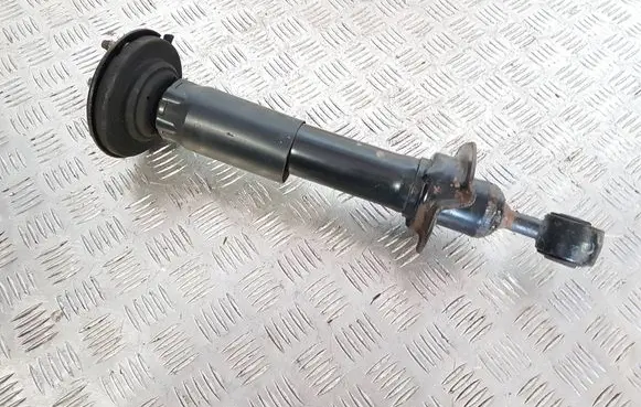 Nissan Pathfinder R51 Front shock absorber/damper 56110EB30B