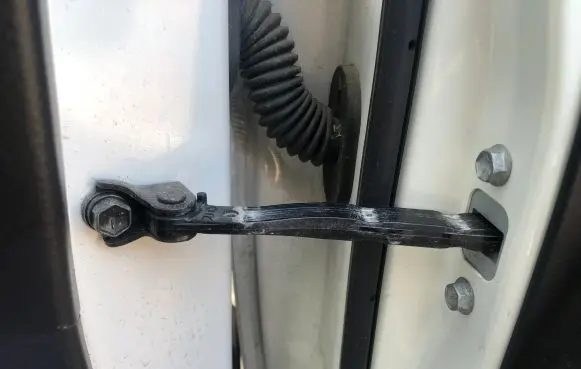 Suzuki Ignis Front door check strap stopper