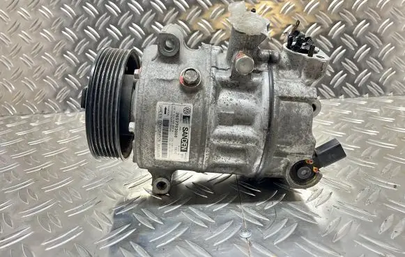 Volkswagen Jetta VI Air conditioning (A/C) compressor (pump) 5C0820803A 2657703000