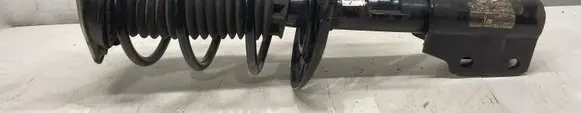 Front shock absorber with coil spring