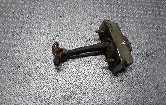 Front door check strap stopper