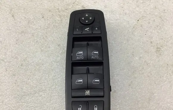 Lancia Thema Electric window control switch 10034858 D186390B 10017665