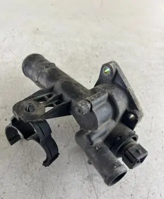 Thermostat/thermostat housing