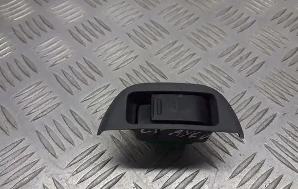 Toyota Aygo AB10 Front door window switch trim 742320H010