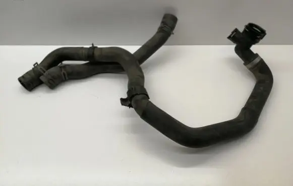 Volkswagen Golf VII Engine coolant pipe/hose 5Q0121049AC