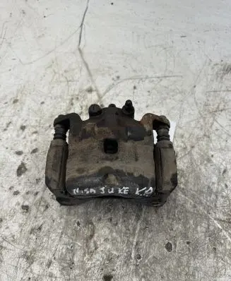 Nissan Juke I F15 Front brake caliper