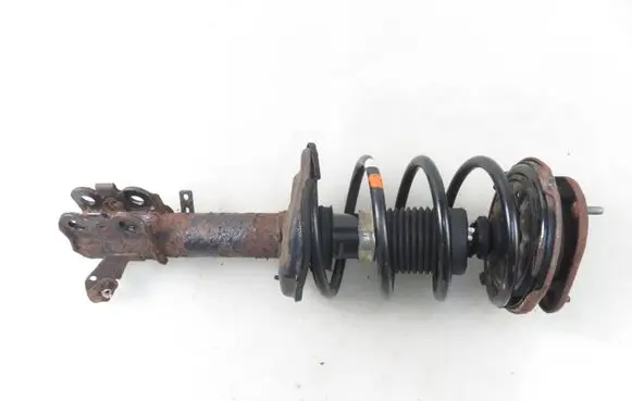 Toyota Corolla E110 Front shock absorber with coil spring 