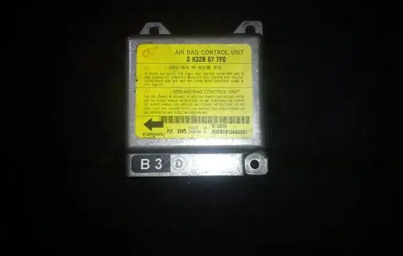KIA Rio Airbag control unit/module 0K32B677F0 G13019