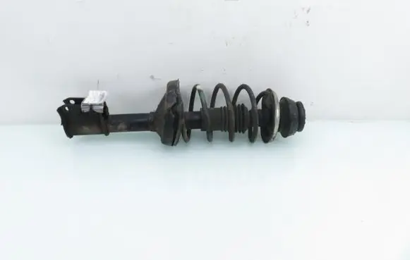Renault Thalia I Front shock absorber with coil spring 
