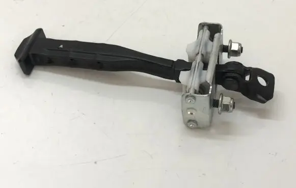 Front door check strap stopper