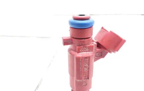 Nissan Almera N16 Fuel injector 0280155940 166009F600