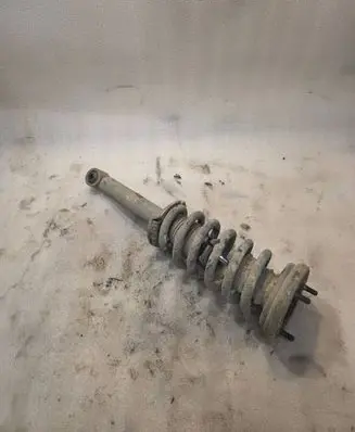 Mitsubishi Pajero Front shock absorber with coil spring 