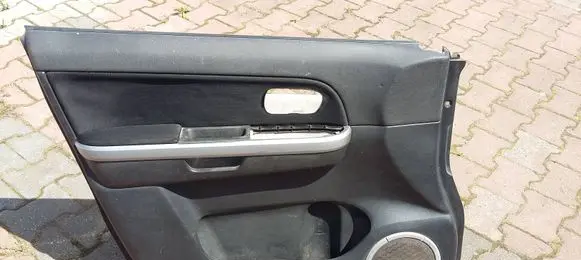 Suzuki Grand Vitara II Front door card panel trim