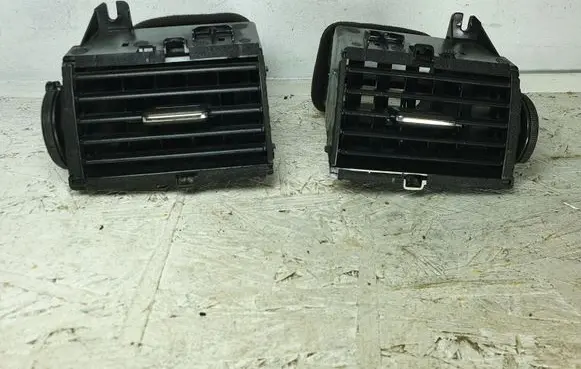 Nissan Pulsar Dash center air vent grill 682603ZL1A