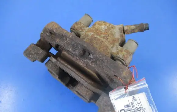 Volkswagen Golf III Front brake caliper