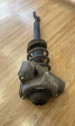Audi A6 S6 C6 4F Front shock absorber with coil spring