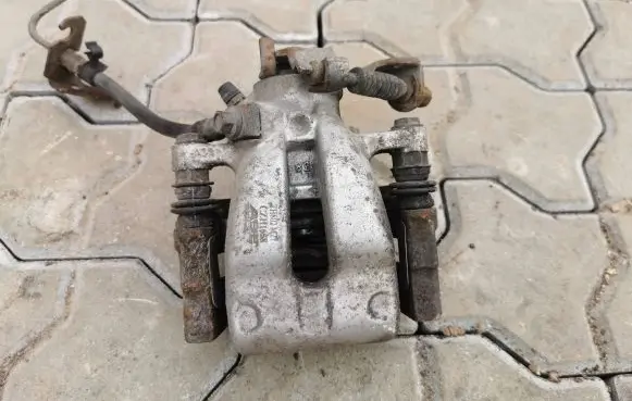 Opel Zafira A Rear brake caliper TH802M27 CZH1658