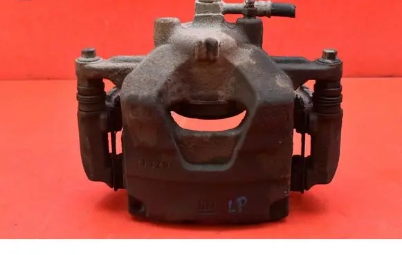 Opel Astra J Front brake caliper