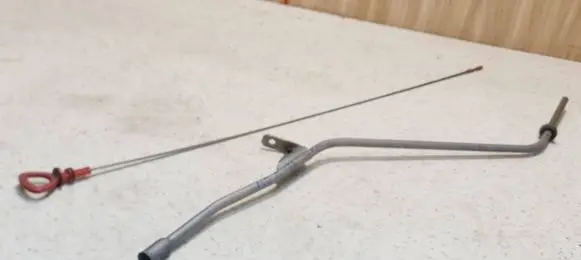 Oil level dip stick