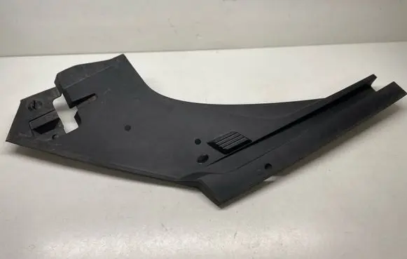 Engine bonnet/hood lock trim molding