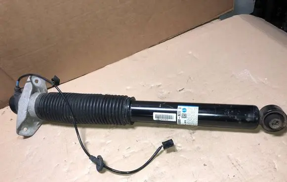 Hyundai Tucson IV NX4 Rear shock absorber/damper 55300N7810