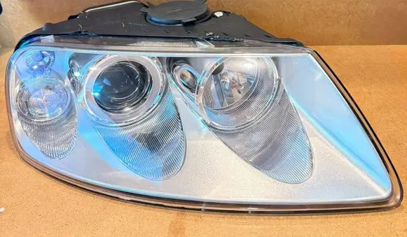 Volkswagen Touareg I Headlight/headlamp 083411119R