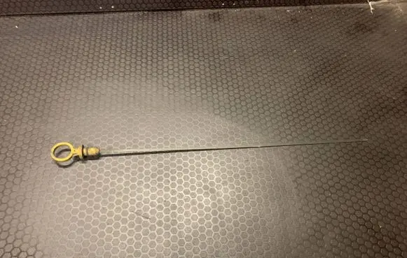 Oil level dip stick