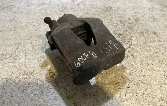 Volkswagen Golf VI Front brake caliper