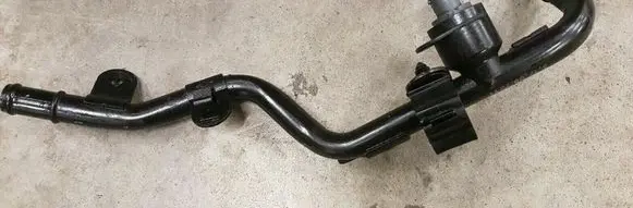 Volkswagen Transporter - Caravelle T5 Engine coolant pipe/hose 7E0121050B