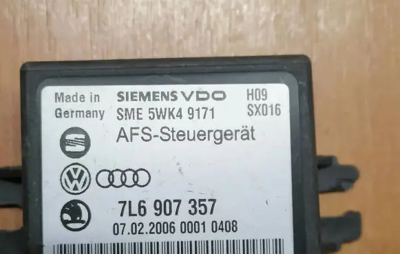 Volkswagen Touareg I Light module LCM 7L6907357 5WK49171 H09SX016