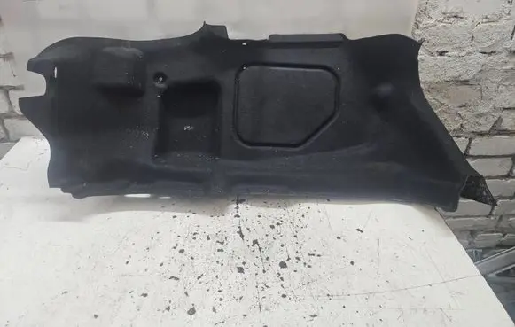 Trunk/boot lower side trim panel