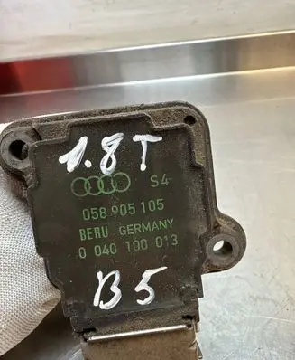 Volkswagen PASSAT B7 High voltage ignition coil 058905105 0040100013