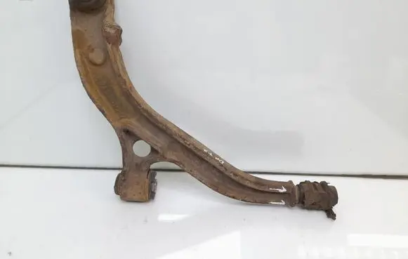 Chrysler Voyager Front lower control arm/wishbone 04694972AA