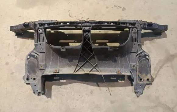 Radiator support slam panel