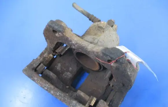 Nissan Almera Tino Front brake caliper