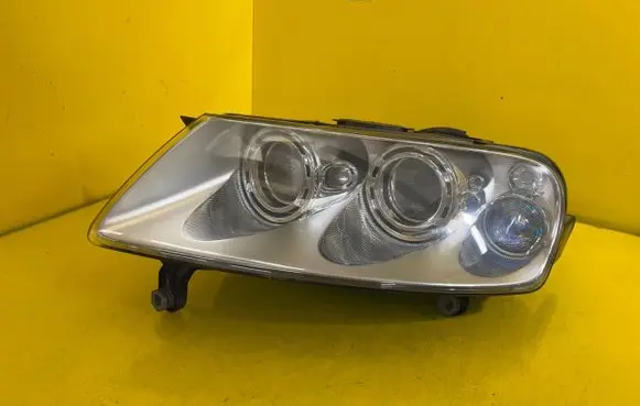 Volkswagen Touareg I Headlight/headlamp 7L6941015