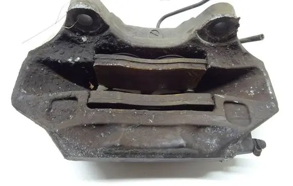 Volkswagen Touareg II Front brake caliper 