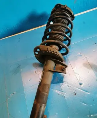 Volkswagen Caddy Front shock absorber with coil spring 1K0413031BA 1k0412103b